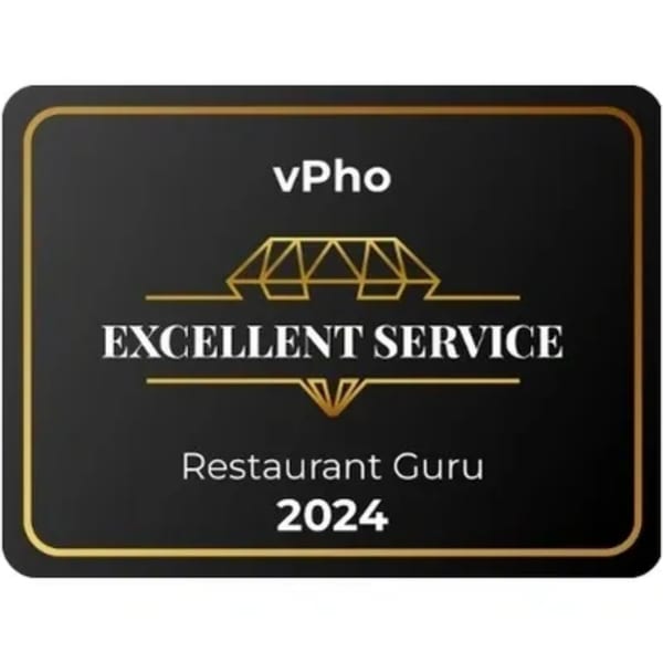 Black and gold vPho Restaurant Guru 2024 "Excellent Service" award plaque.